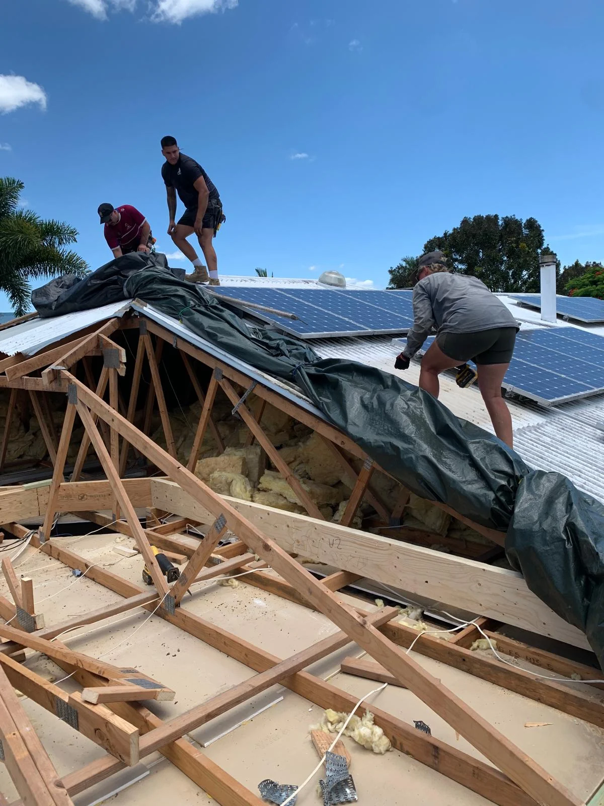 Stacey working on the roof during renovations.
